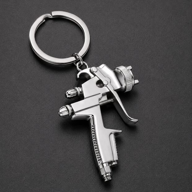 Mini chrome spray gun keyring with detailed nozzle and trigger