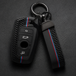 BMW M Sport black silicone key cover and matching keychain set with tri-colour stripe